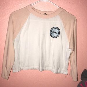 sleeve that says “In Memory Of When I Cared “